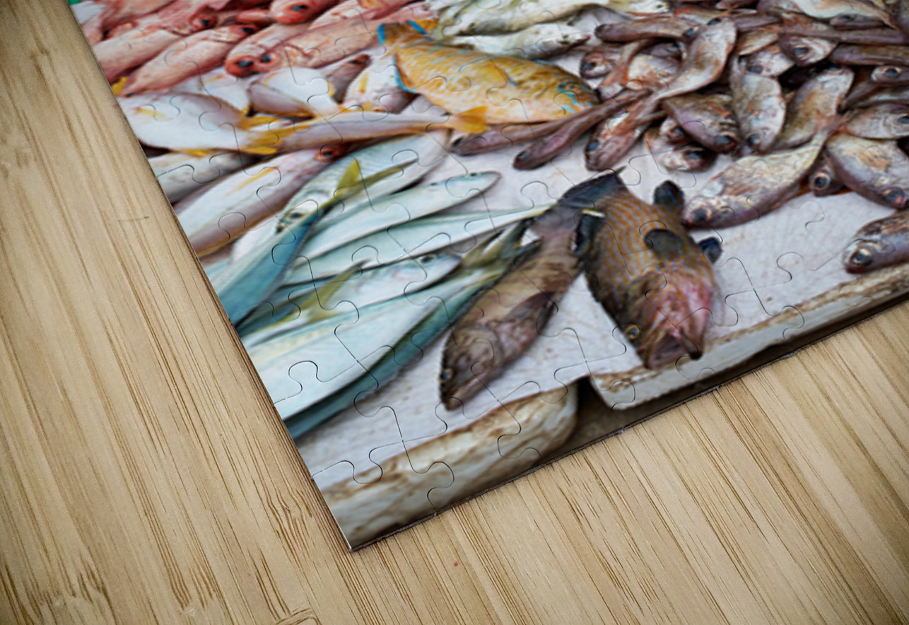 Fish seller in Phu Quoc market shows fresh catch for sale Marco Brivio Puzzle