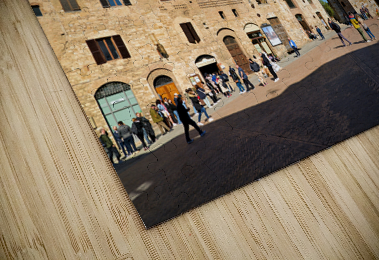Visitors explore Piazza della Cisterna in San Gimignano Marco Brivio Puzzle