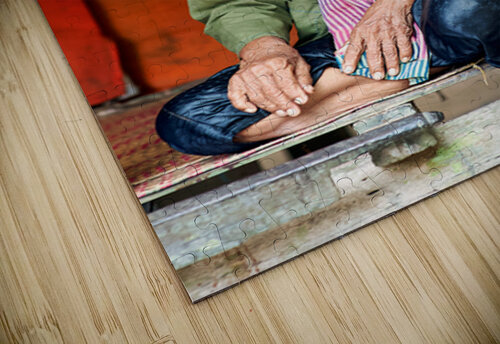Elderly person in traditional clothing sitting calmly. Marco Brivio puzzle