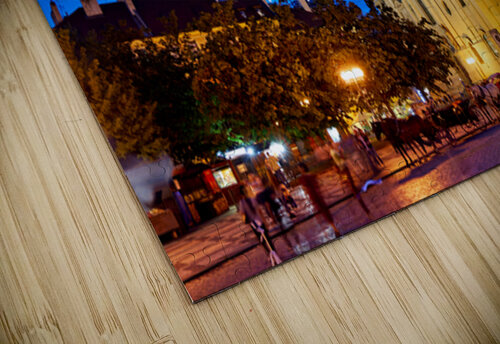 Illuminated church and lively square at night. Marco Brivio puzzle