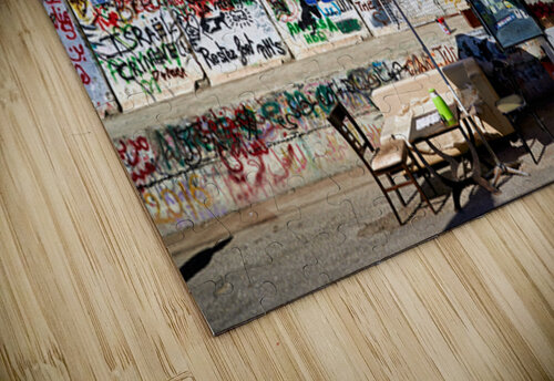 Separation wall in Bethlehem with a juice stand near graffiti Marco Brivio puzzle