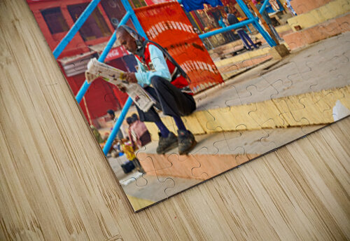 Sacred cow in Varanasi with people and shops in background Marco Brivio puzzle