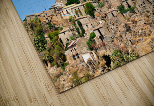 Pentedattilo in Calabria shows old buildings and rocky cliffs Marco Brivio puzzle