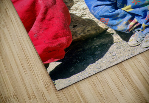 Indigenous child in colorful clothes and yellow hat outdoors. Marco Brivio puzzle