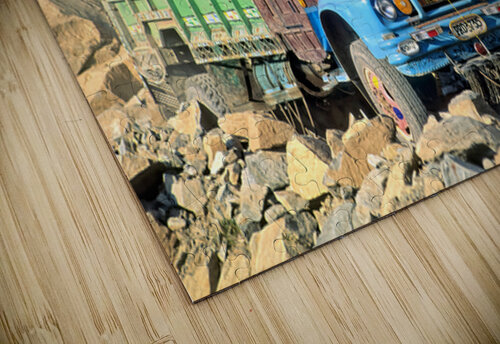 Trucks travel toward Shandur Pass in Pakistans rugged terrain Marco Brivio puzzle