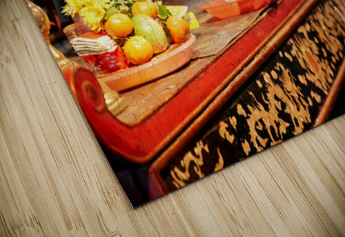 Person offers prayers at altar with fruits in Ho Chi Minh Marco Brivio puzzle