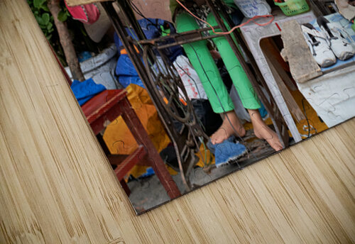 Sewing clothes at a market stall in Phu Quoc Vietnam Marco Brivio puzzle