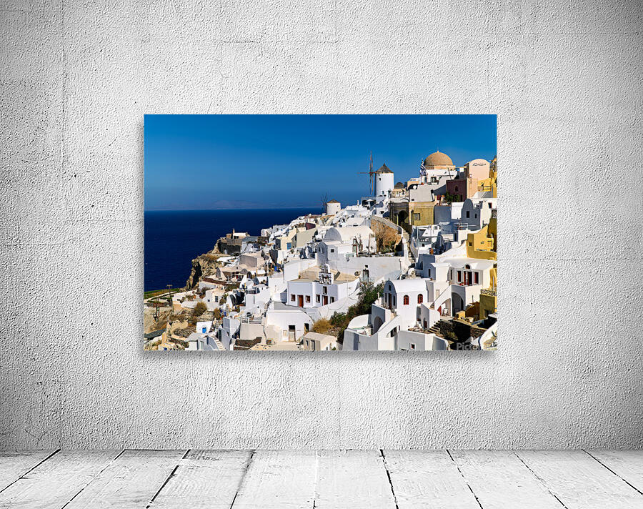Oia Santorini: white cliffside village windmills and deep blu Wall Preview
