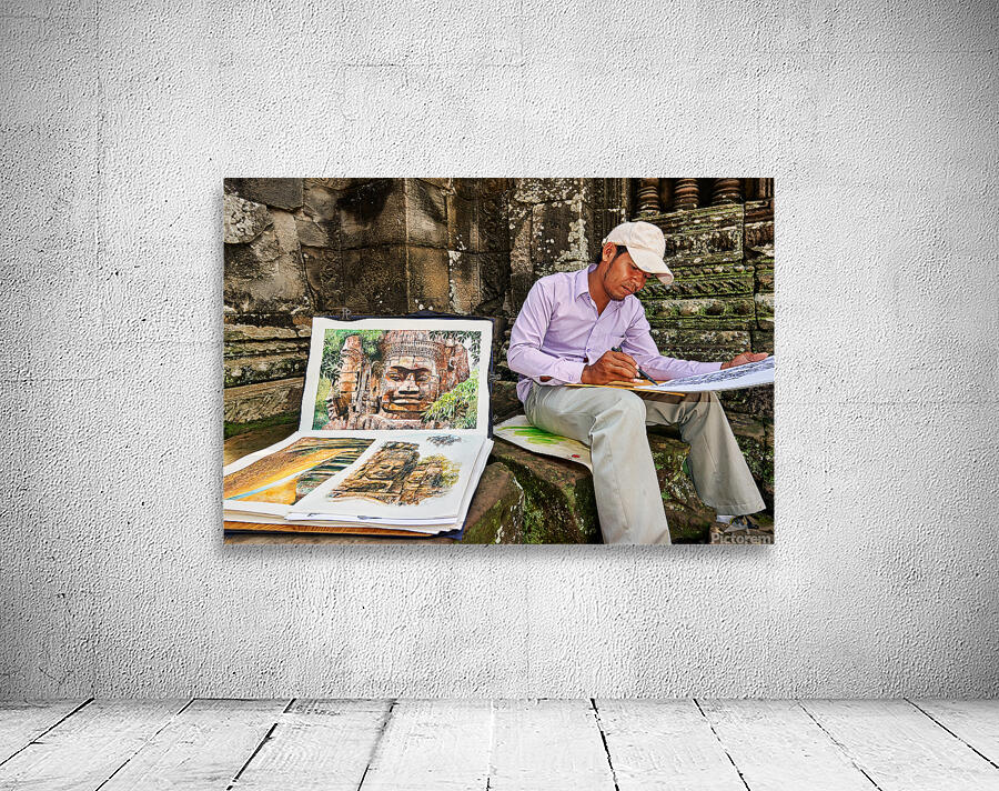 Artist drawing ancient temple carvings outdoors. Wall Preview