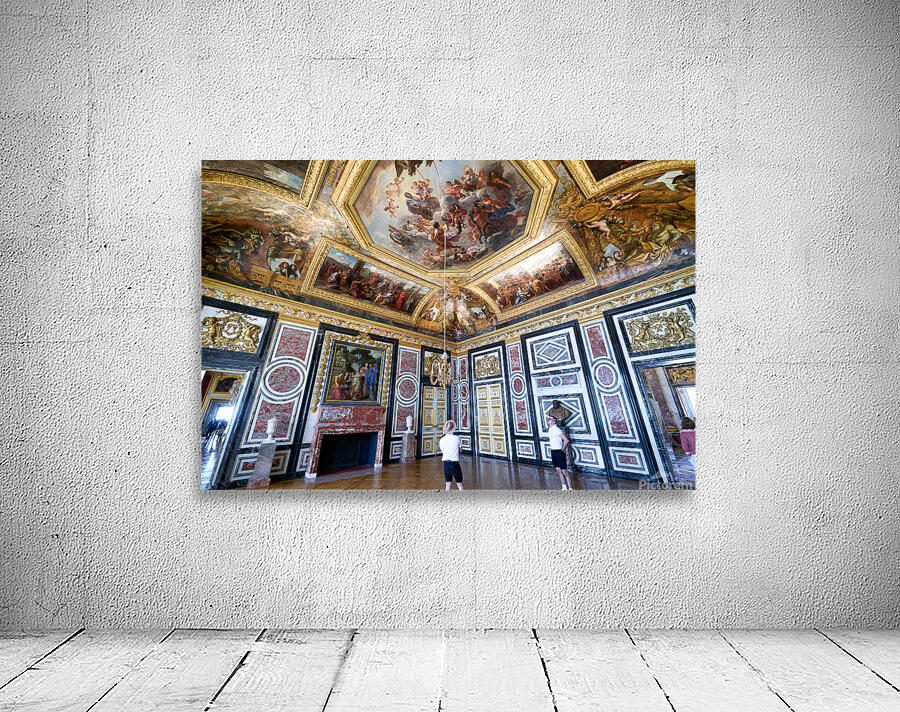 Two people explore the decorated room at the Palace of Versaille Wall Preview