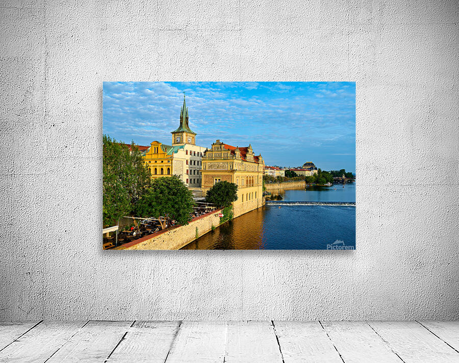Pragues Vltava riverfront with historic architecture and lively Wall Preview
