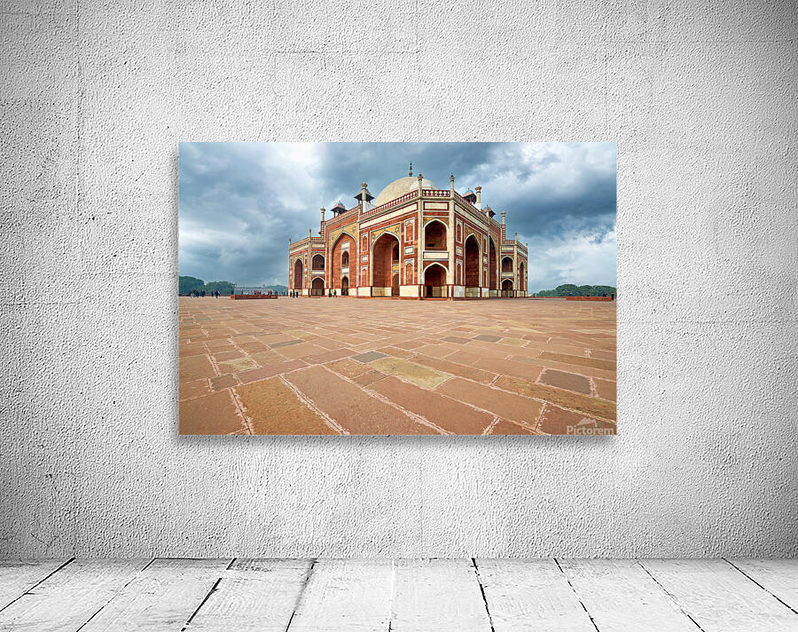 Humayuns Tomb stands in Delhi under a cloudy sky Wall Preview