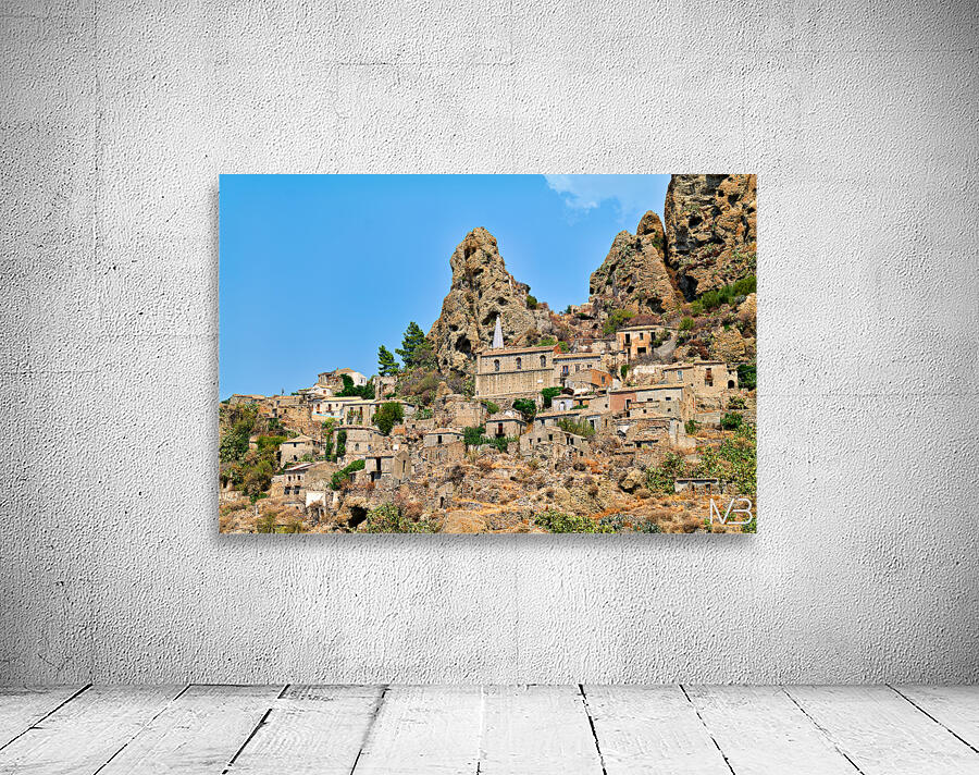 Pentedattilo in Calabria shows old buildings and rocky cliffs Wall Preview