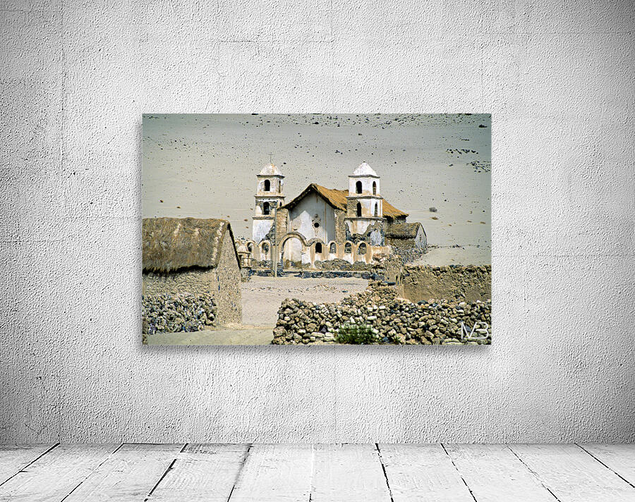 Dilapidated church and stone buildings in a barren desert landsc Wall Preview