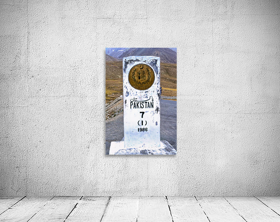 Distance marker showing 7 kilometers to Pakistan on road in 1986 Wall Preview
