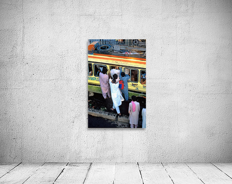 People boarding a bus in Lahore during busy hours Wall Preview