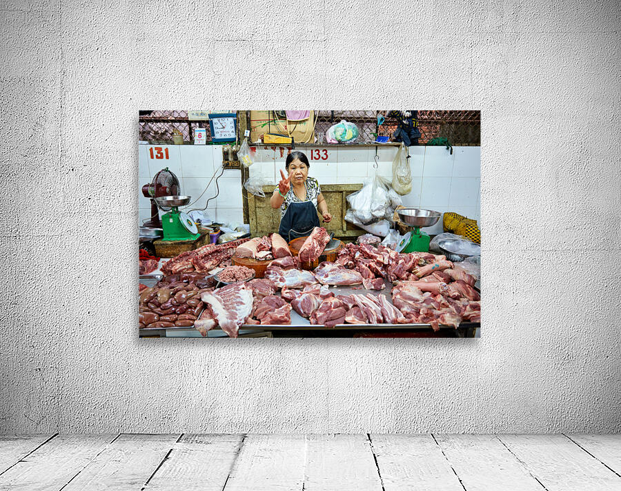 Market scene in Ho Chi Minh City with meat vendor Wall Preview