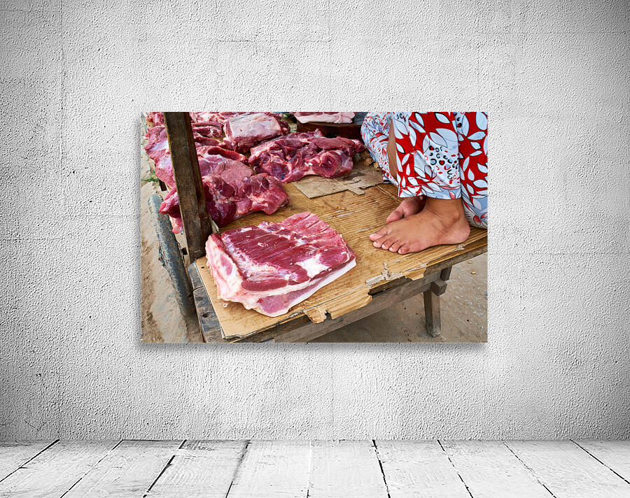 Fresh meat vendor in Phu Quoc market during daytime Wall Preview