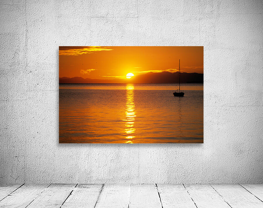 Midnight sun at Longyearbyen in Svalbard with a boat on the water Wall Preview