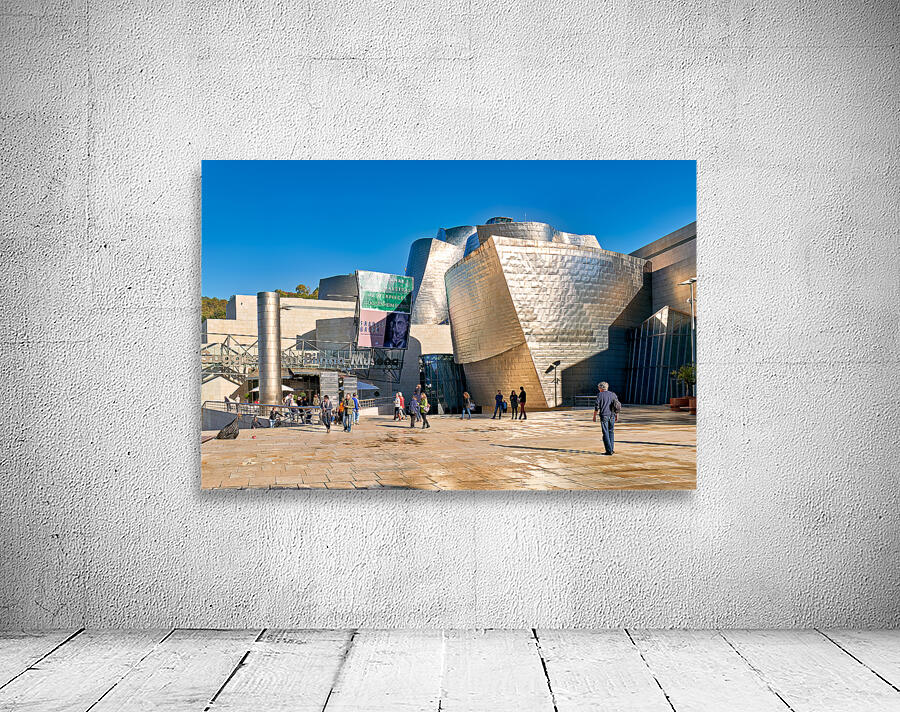 People walking near Guggenheim Museum in Bilbao Spain Wall Preview