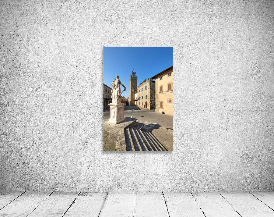 Palazzo dei Priori and statue in Arezzo Tuscany Italy Wall Preview