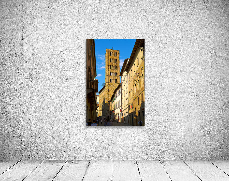 People walk along a street in Arezzo Tuscany Italy Wall Preview
