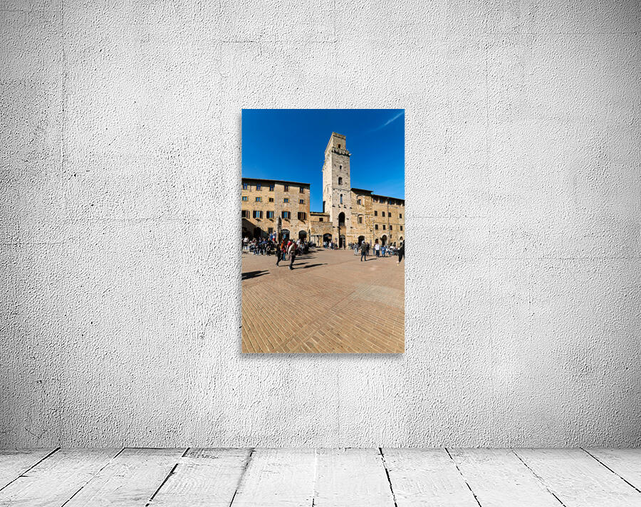 Visitors gather in San Gimignano at Piazza della Cisterna Wall Preview