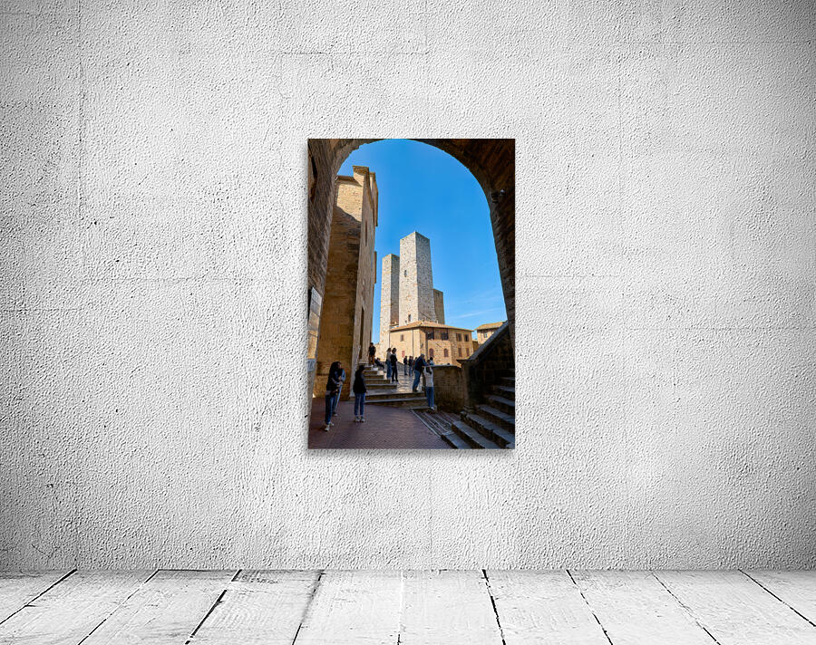 Visitors enjoy Piazza del Duomo in San Gimignano Italy Wall Preview