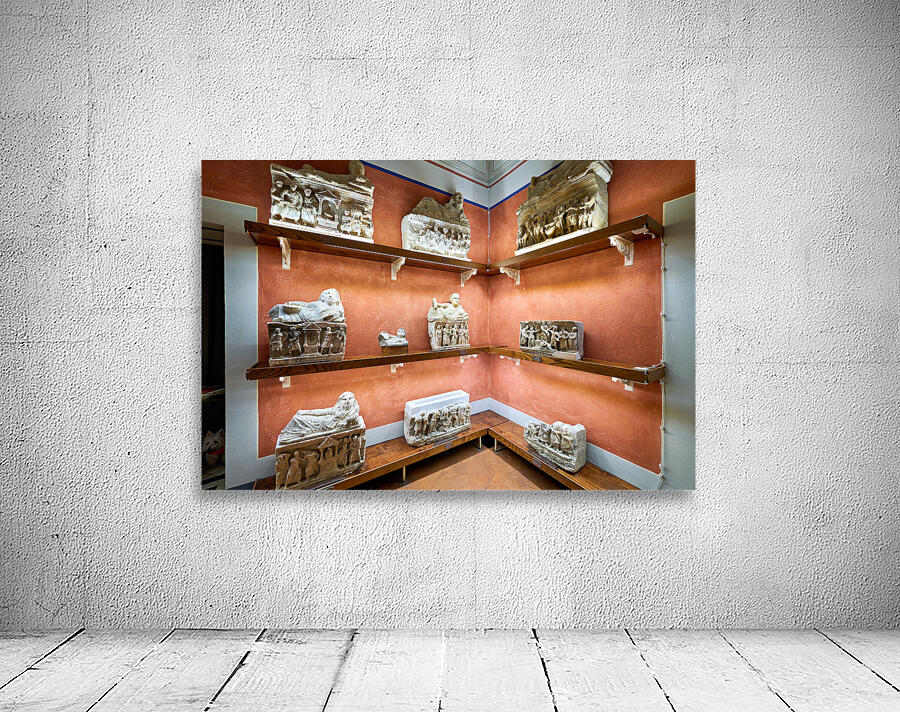 Exploring cinerary urns at Guarnacci Museum in Volterra Wall Preview