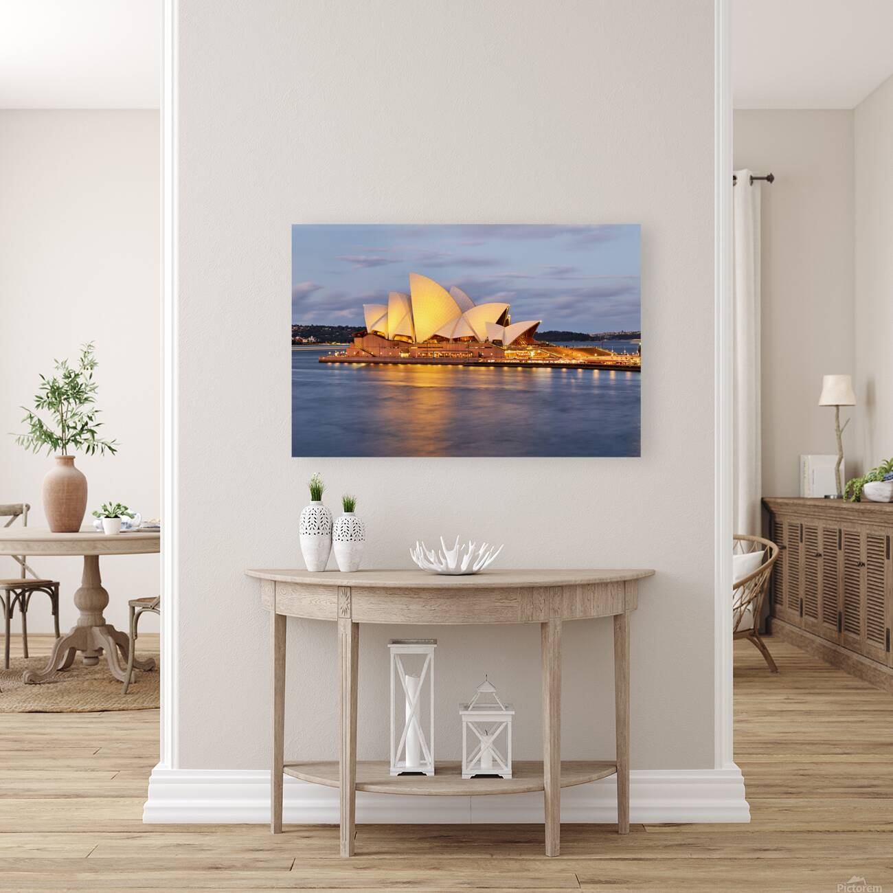 Sydney Opera House illuminated at dusk with harbor reflections. Reproduction
