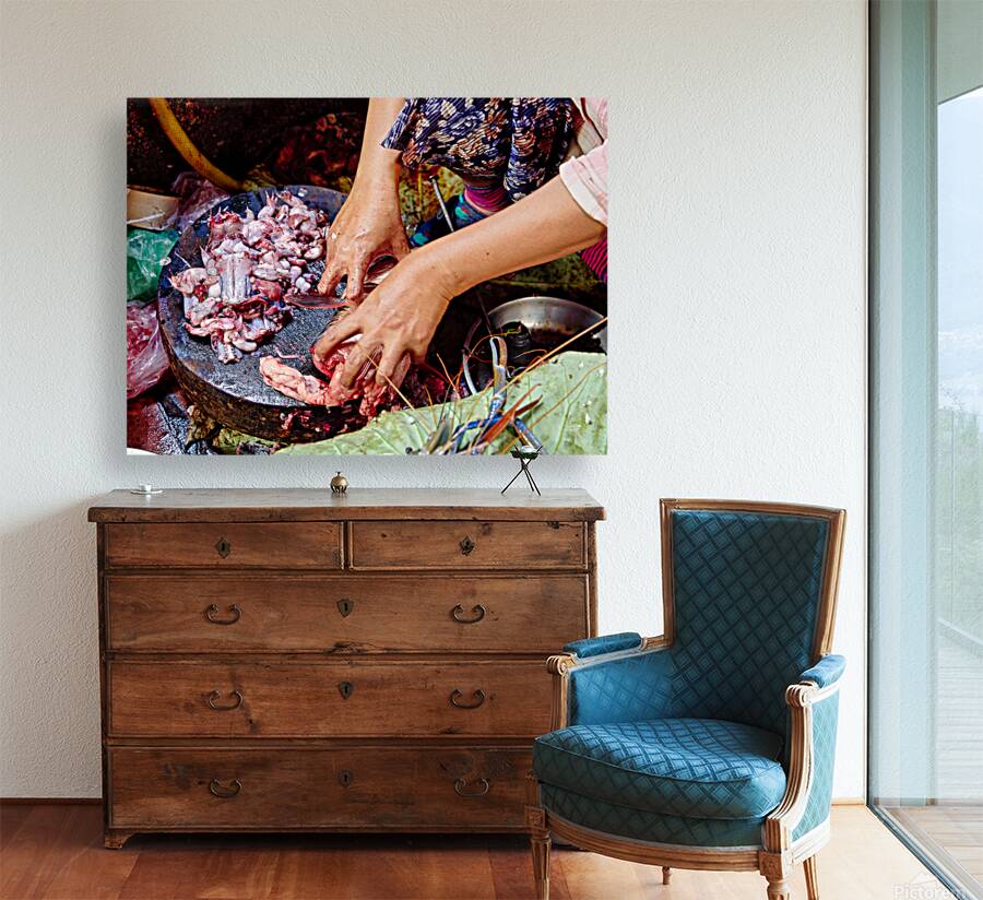 Hands preparing raw frog meat and seafood. Reproduction