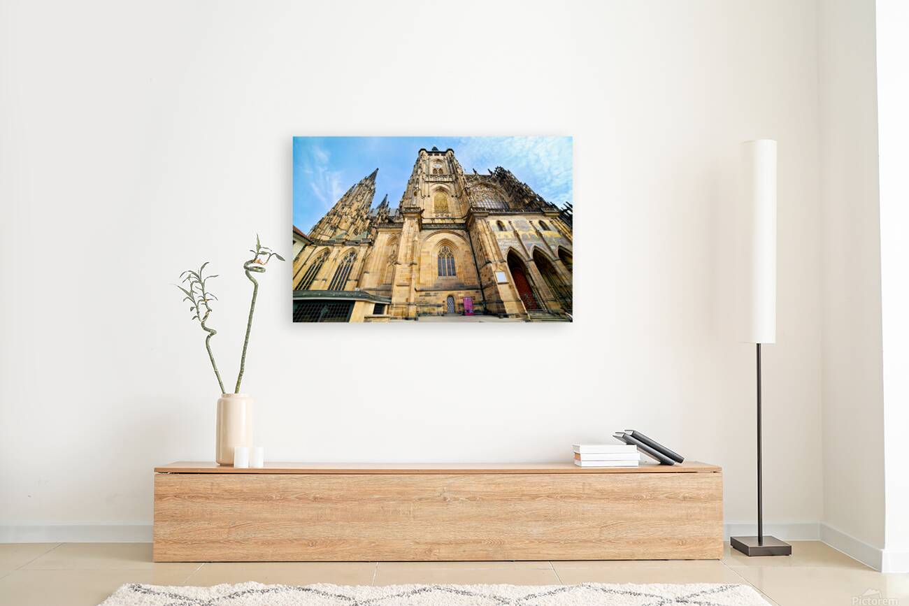 Ornate St. Vitus Cathedral facade against a blue sky. Reproduction