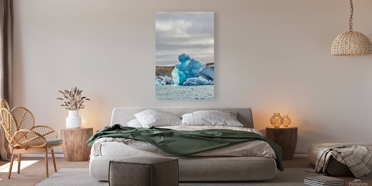 Icebergs float in Jokulsarlon lagoon Iceland by day Reproduction