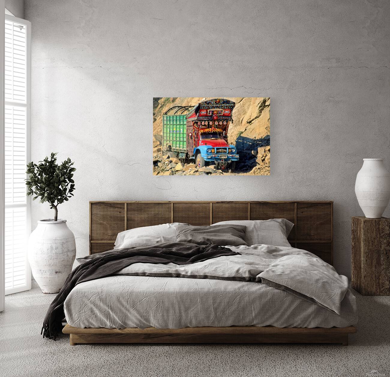 Trucks travel toward Shandur Pass in Pakistans rugged terrain Reproduction