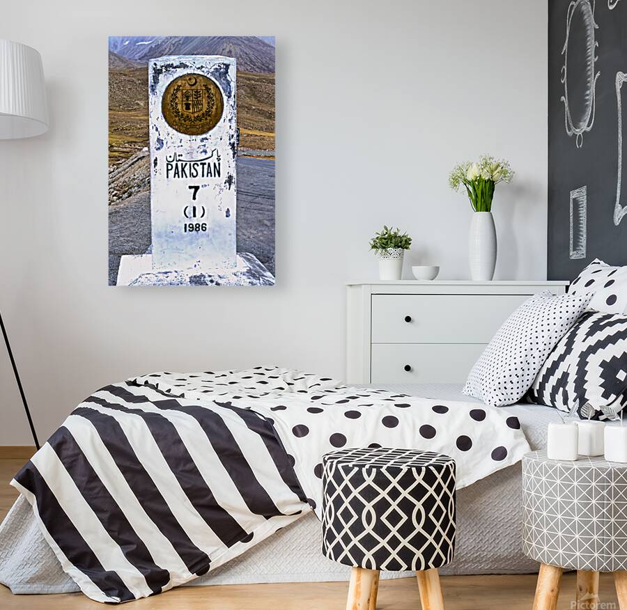 Distance marker showing 7 kilometers to Pakistan on road in 1986 Reproduction