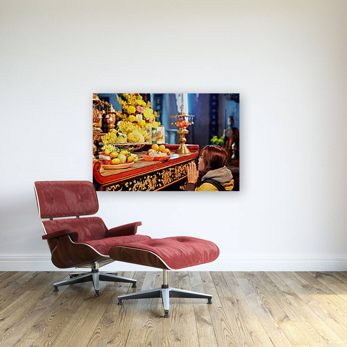 Person offers prayers at altar with fruits in Ho Chi Minh Reproduction