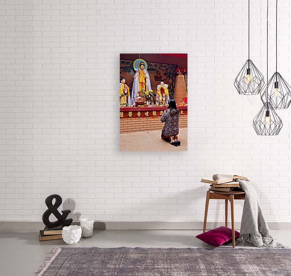 Prayer at Buddhist shrine in Ho Chi Minh City Vietnam Reproduction