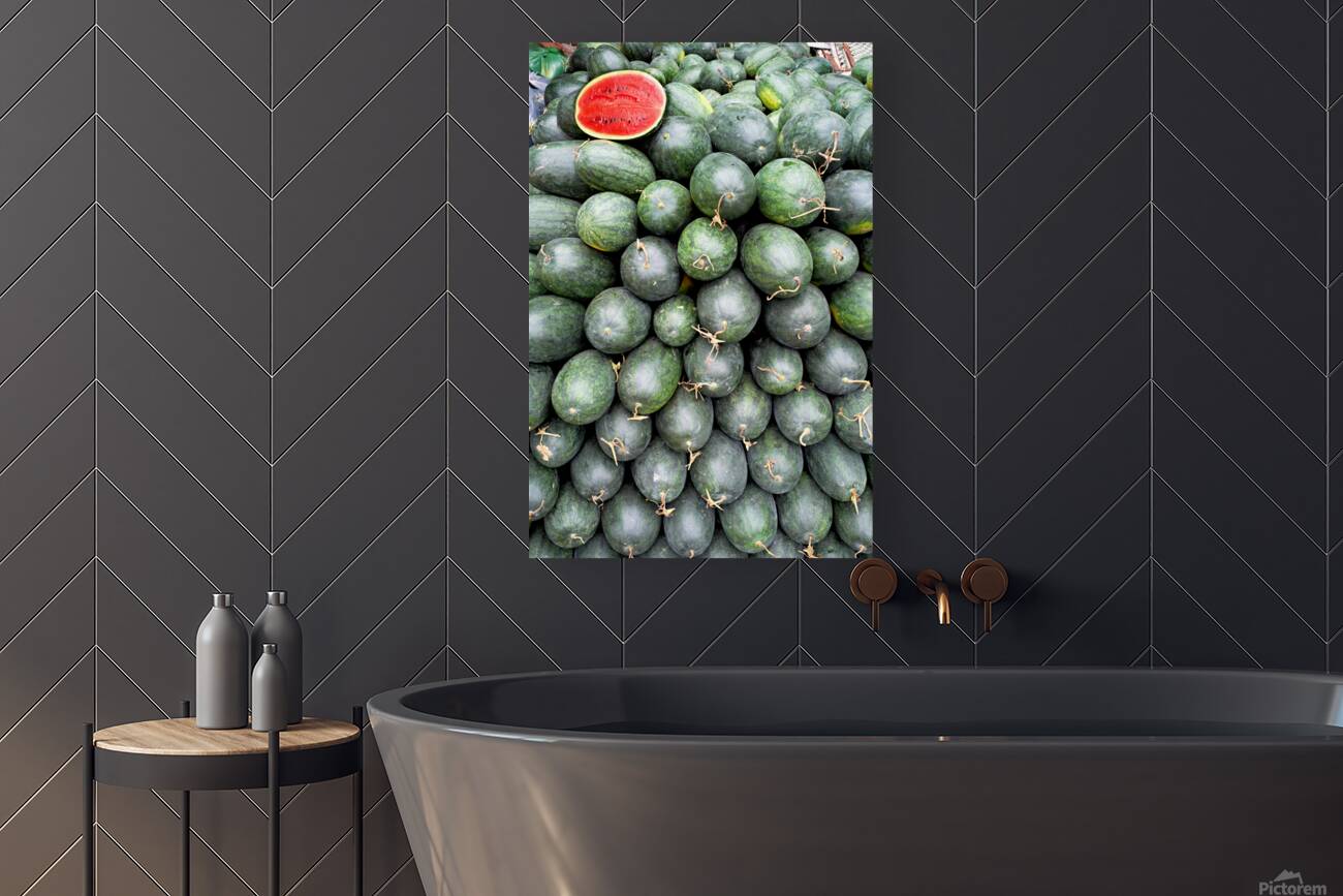 Watermelons stacked at a market in Phu Quoc Vietnam Reproduction