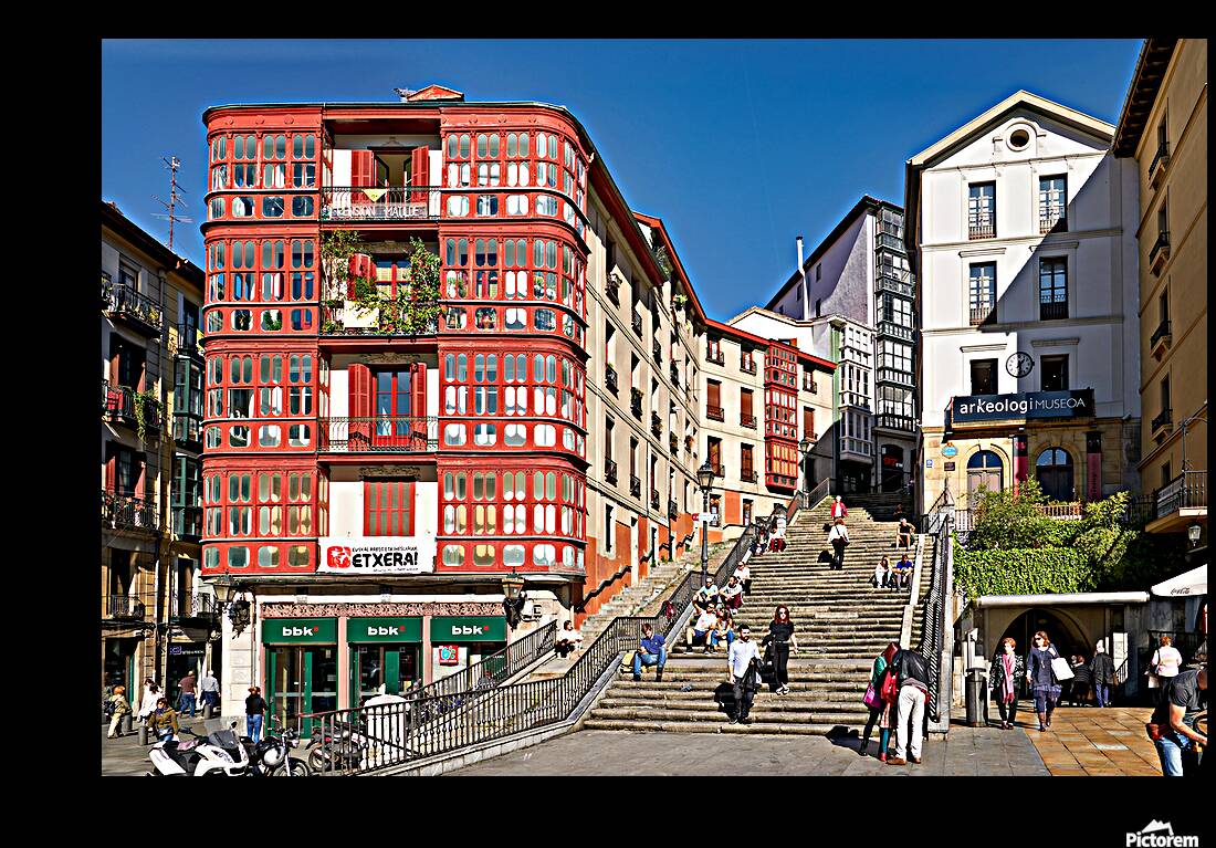 Stairs and buildings in downtown Bilbao Spain during the day Reproduction