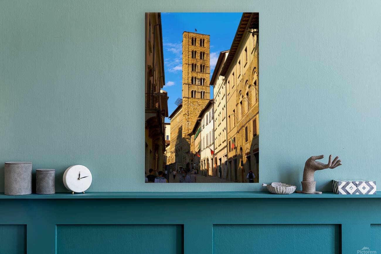 People walk along a street in Arezzo Tuscany Italy Reproduction