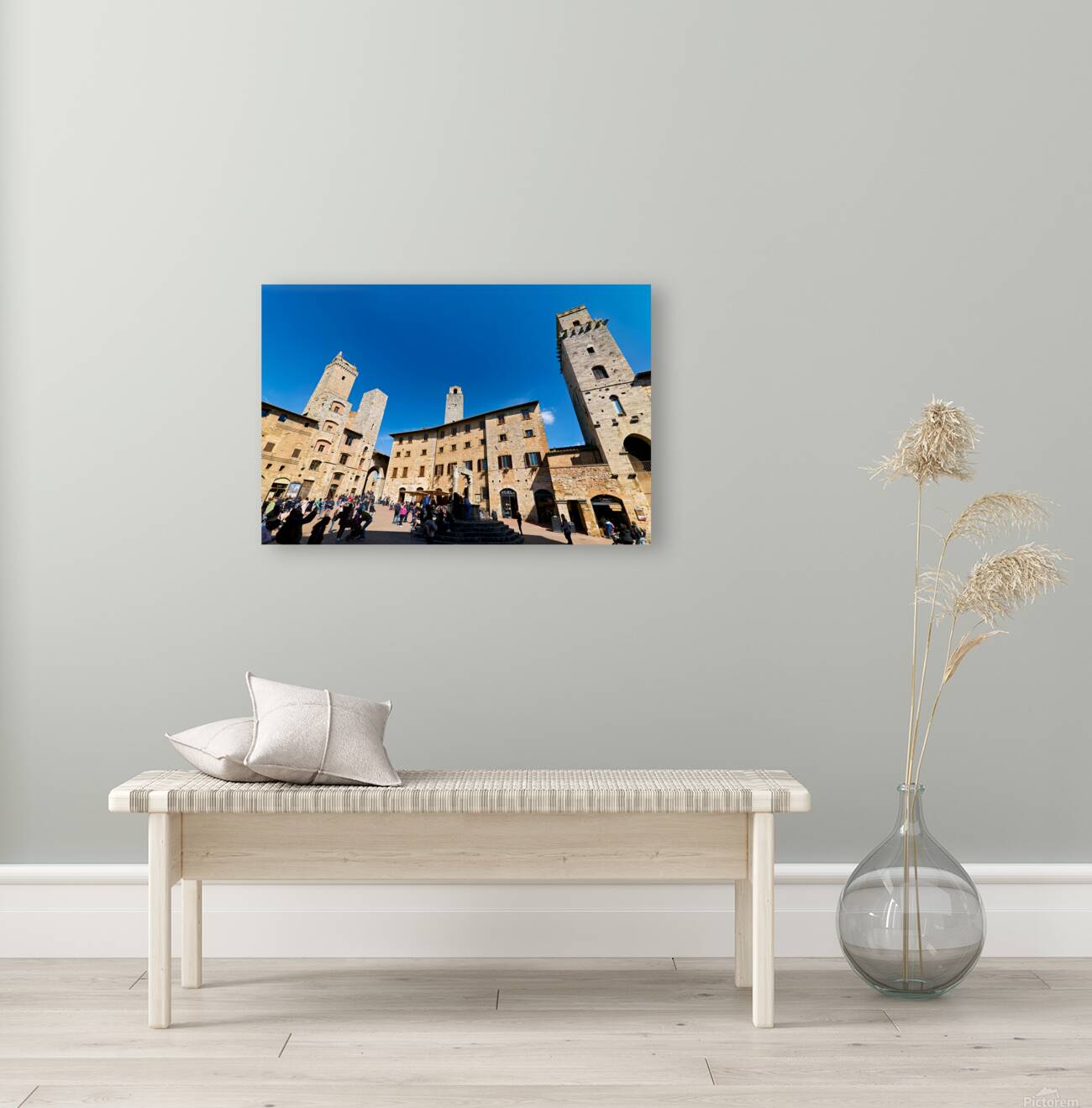 Visitors walk through Piazza della Cisterna in San Gimignano Reproduction