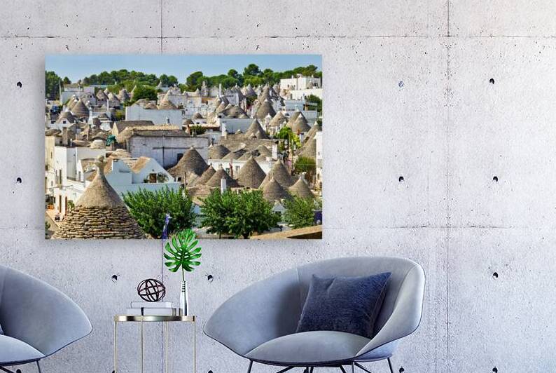 Apulia Puglia Italy. Alberobello. Trulli: traditional Apulian dry stone huts with a conical roof. by Marco Brivio