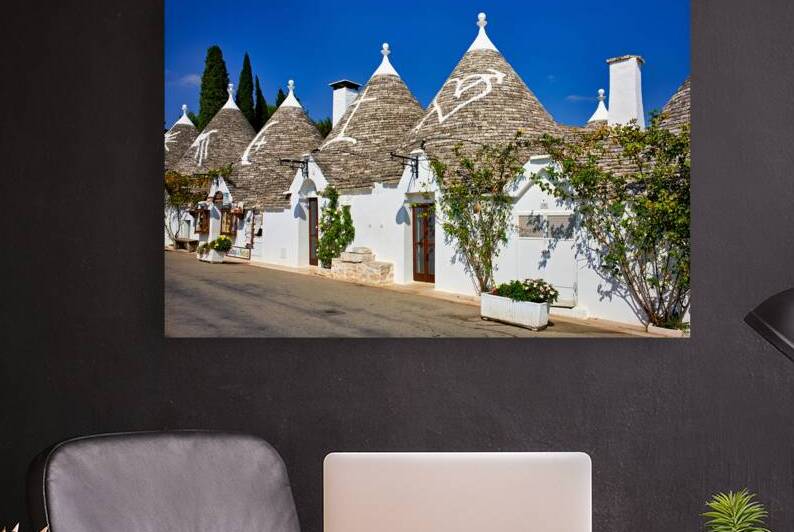 Apulia Puglia Italy. Alberobello. Trulli: traditional Apulian dry stone huts with a conical roof. by Marco Brivio