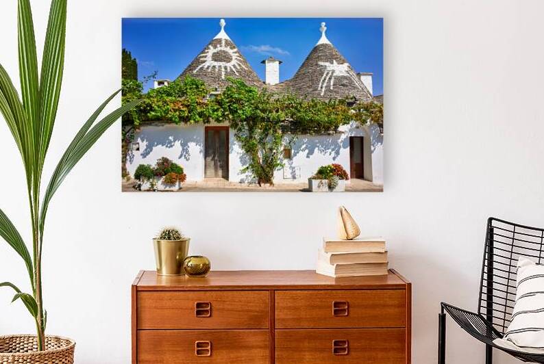 Apulia Puglia Italy. Alberobello. Trulli: traditional Apulian dry stone huts with a conical roof. by Marco Brivio