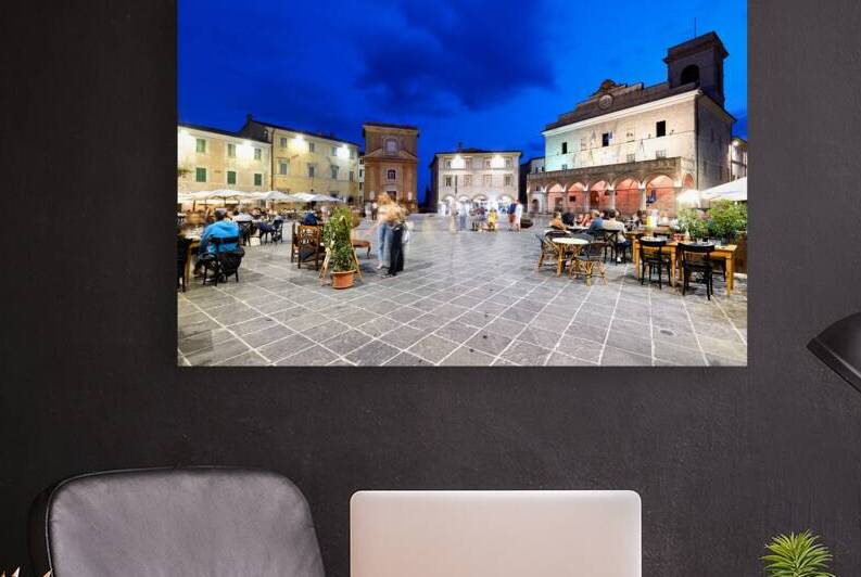 Montefalco Umbria Italy. Piazza del Comune at sunset. People eating out by Marco Brivio
