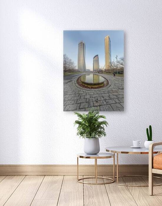 Milan Italy. Modern skyscrapers and reflective pond in a city pa by Marco Brivio