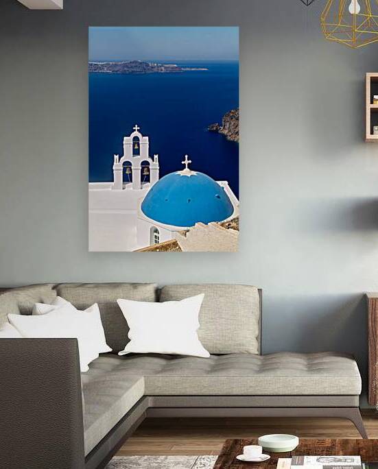 Blue domed church and bell tower overlooking Santorinis caldera by Marco Brivio