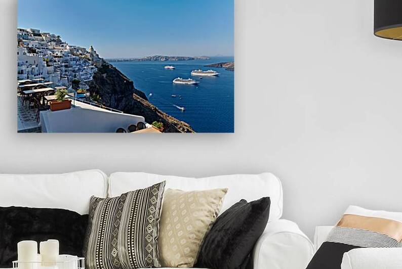 Santorinis white village blue caldera and cruise ships. by Marco Brivio