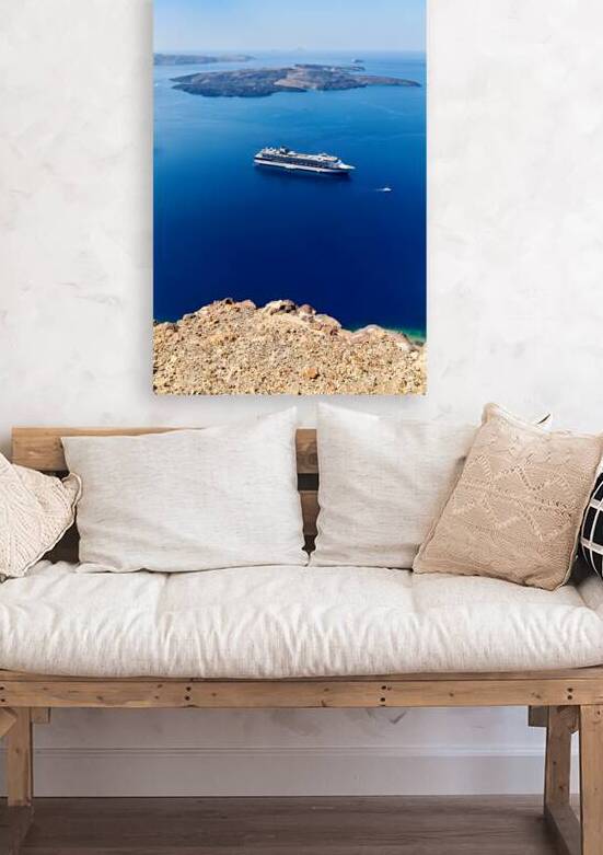 Cruise ship in deep blue sea volcanic islands rocky foreground by Marco Brivio