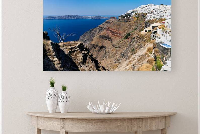 Picturesque Santorini: white village blue sea volcanic cliffs. by Marco Brivio